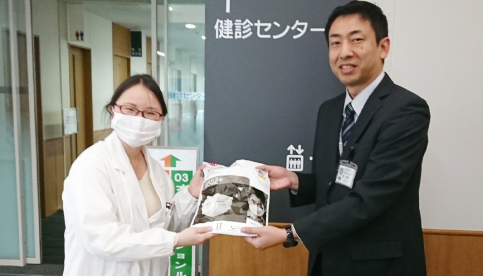 Masks and disinfectants being donated to Kariya Toyota General Hospital (left)