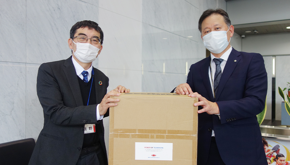 Masks and disinfectants being donated to Kita-ku, Osaka (right)